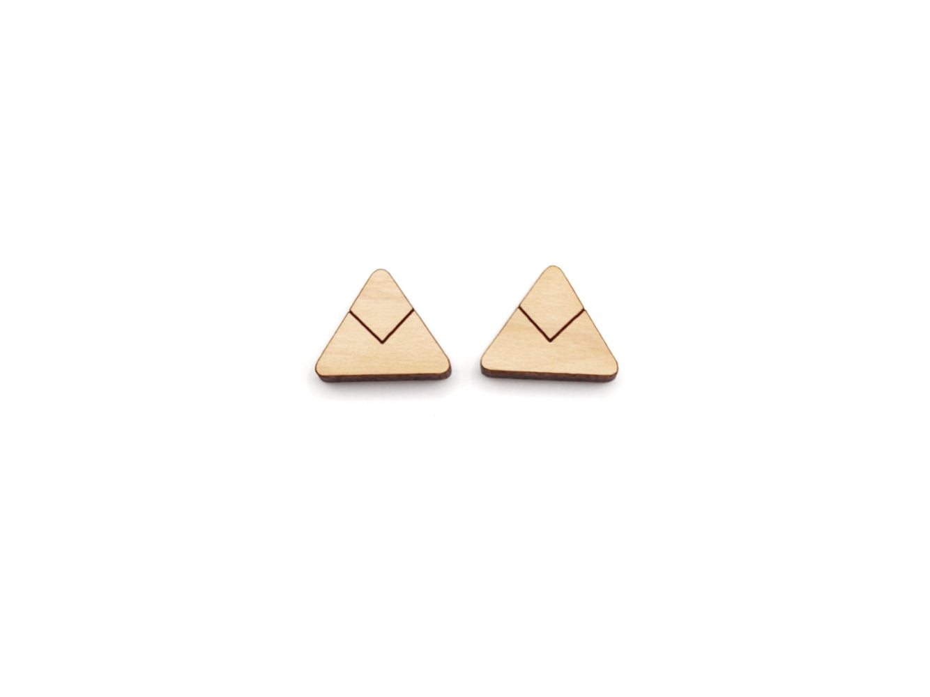 a pair of wooden cabochon stud earring blanks cut and engraved to look like a triangle with a chevron line