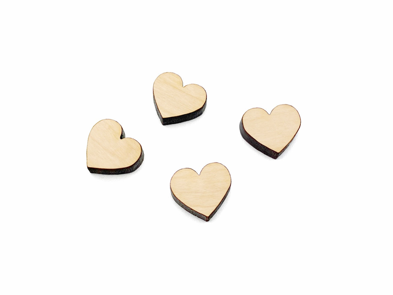 A pair of wood and acrylic cabochon earring blanks cut in the shape of a heart