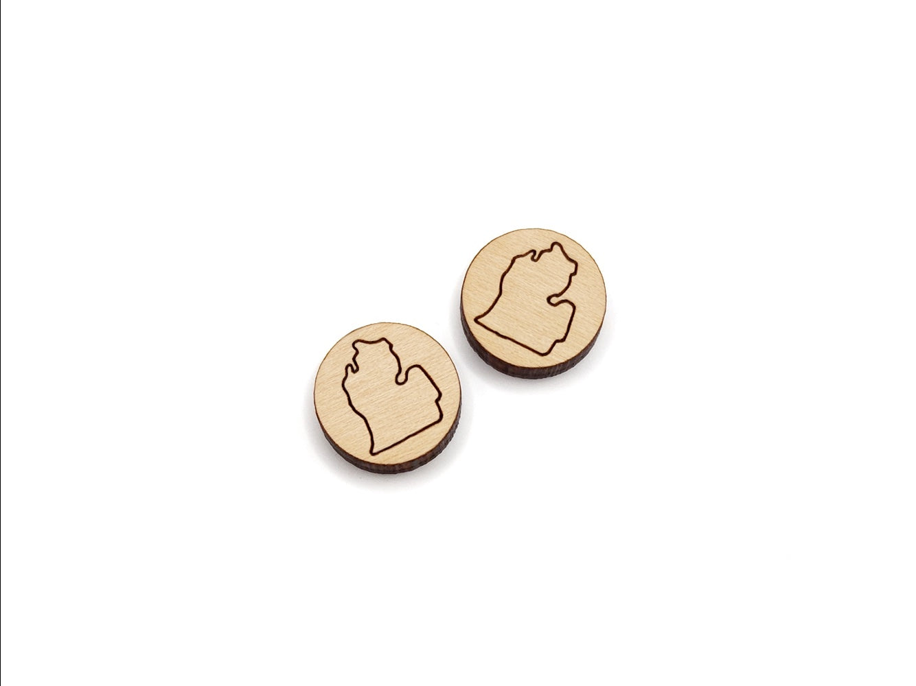 a pair of round wooden cabochon earring blanks engraved with the outline of the Michigan Mitten