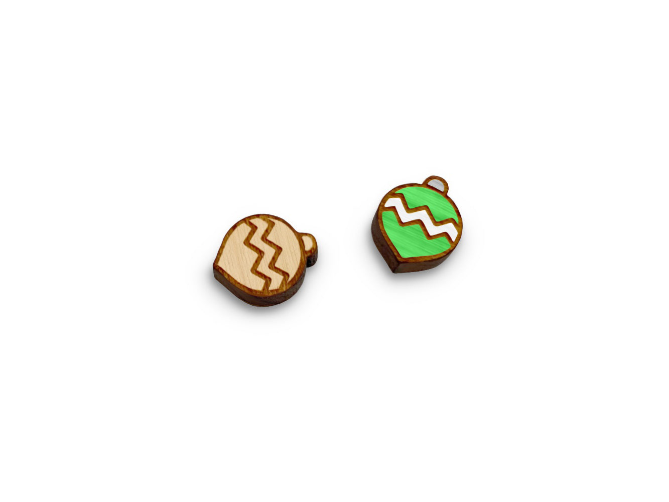 a pair of wooden cabochon stud earring blanks cut and engraved to look like a Christmas ornament
