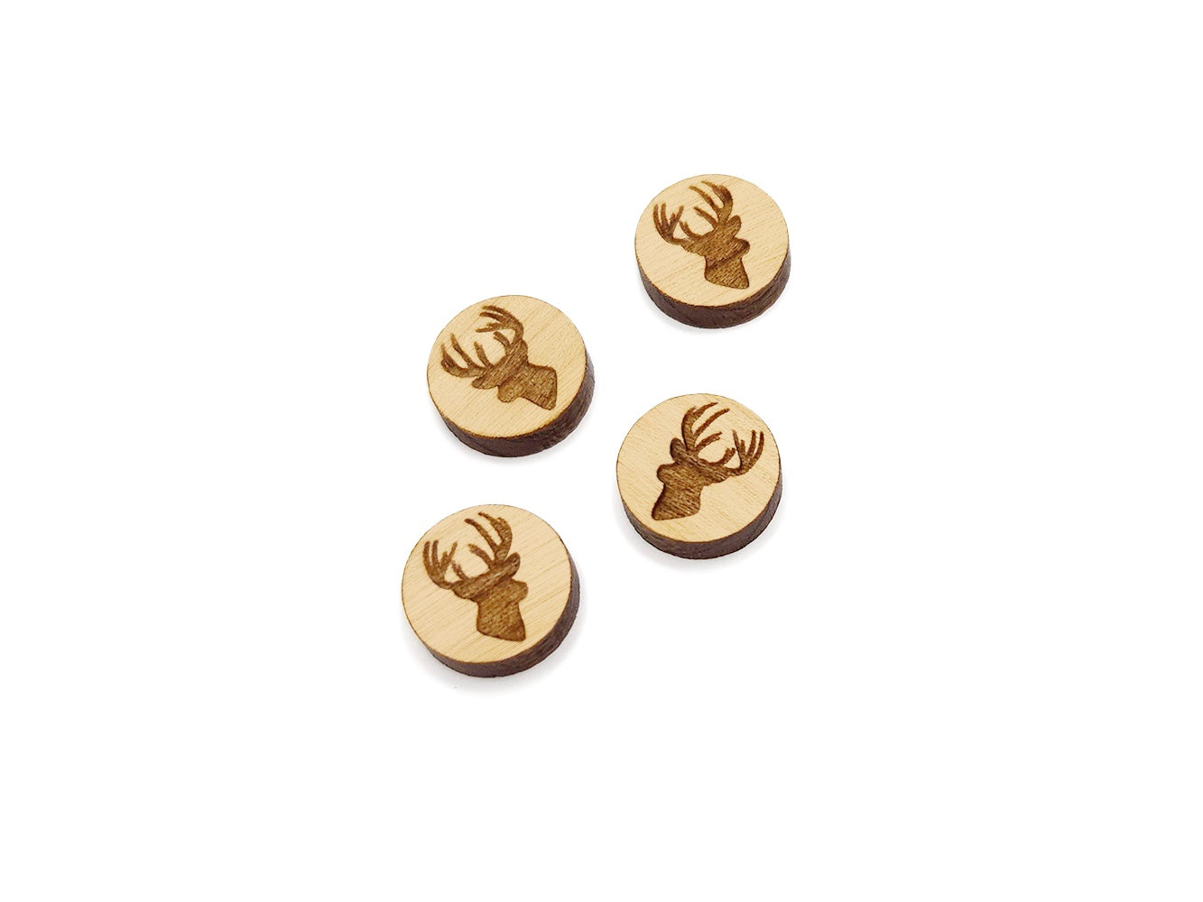 three wooden buttons with a deer head on them