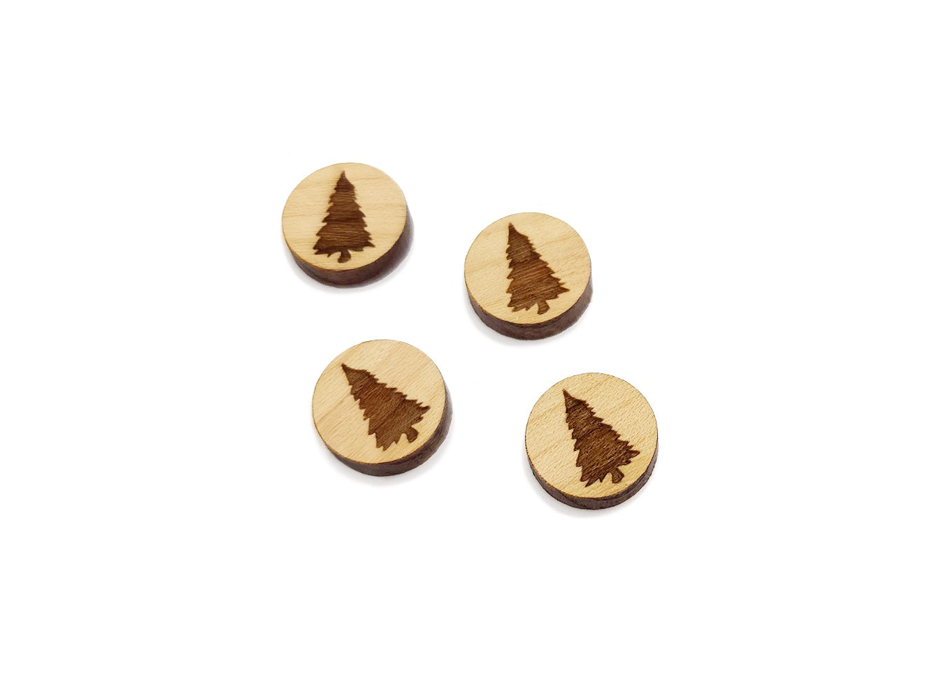 two pairs of round wooden cabochon earring blanks engraved with a pine tree silhouette