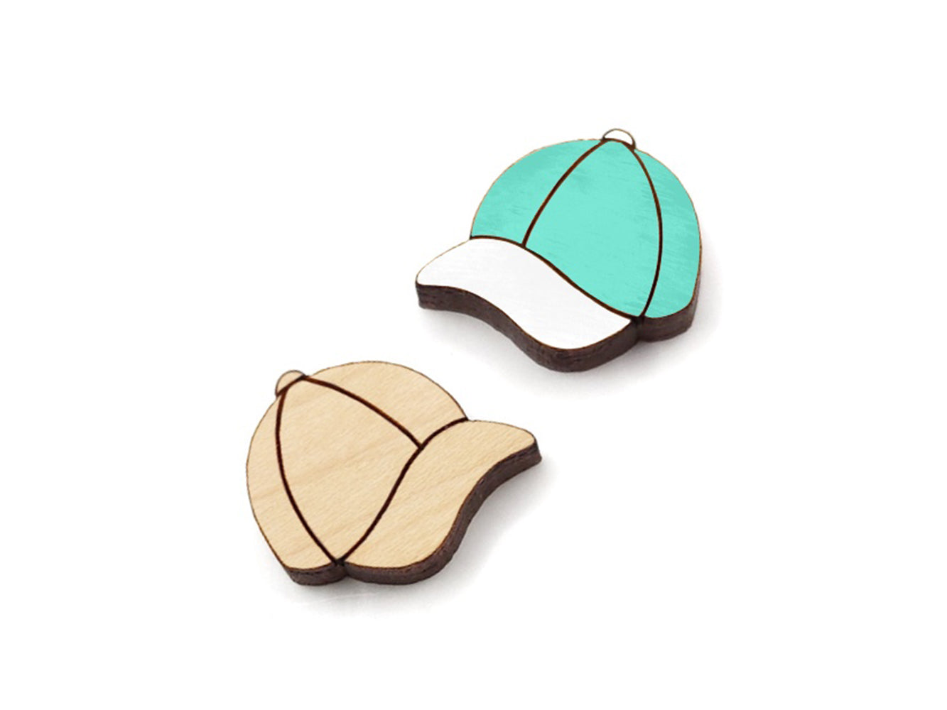 a pair of small wooden cabochon blanks for stud earrings, cut and engraved to look like baseball caps