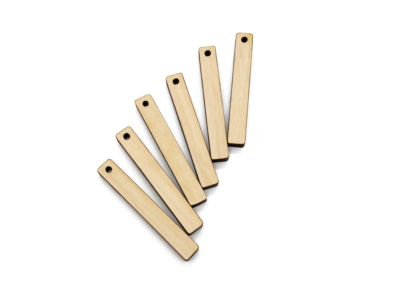 three pairs of bar-shaped wood or acrylic jewelry charm blanks