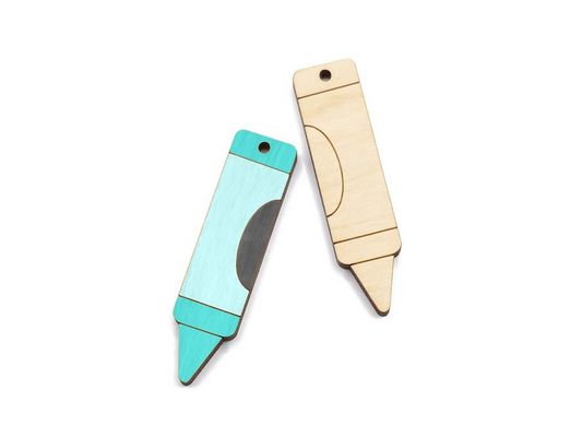 a pair of wooden earring blanks cut and engraved to look like a crayon