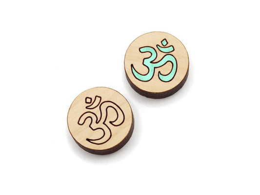 a pair of small round wooden cabochon blank for stud earrings engraved with an om yoga symbol.