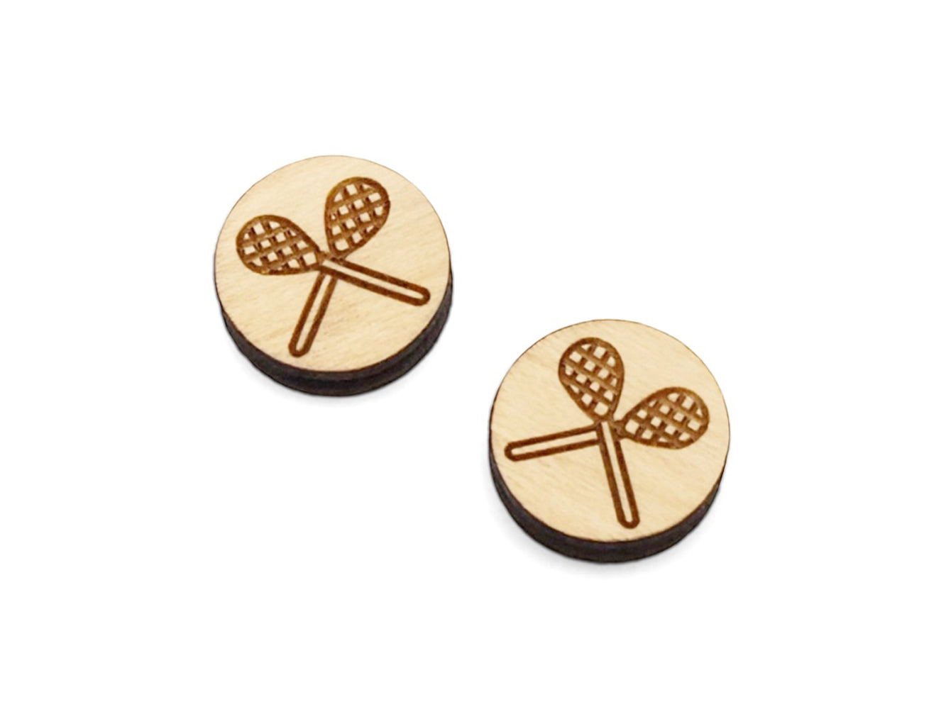 a pair of small round wooden cabochon blanks for stud earrings engraved with a lacrosse design