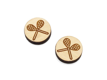 a pair of small round wooden cabochon blanks for stud earrings engraved with a lacrosse design