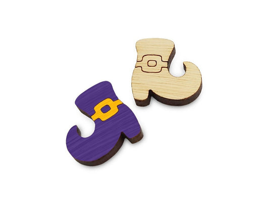 a pair of wooden cabochon earring blanks cut and engraved to look like Halloween witch shoes
