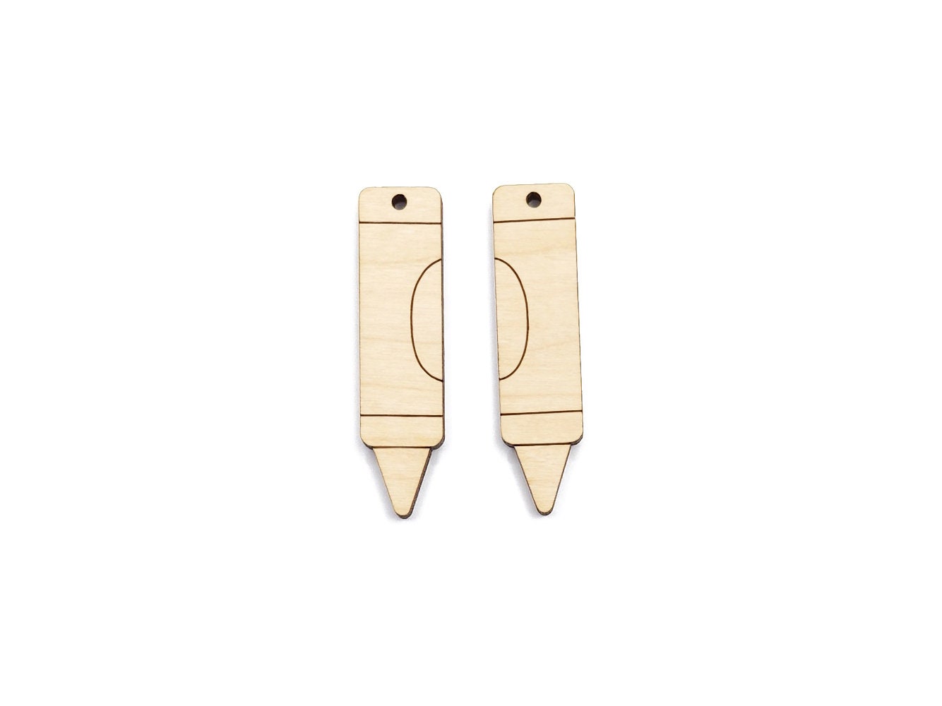 a pair of wooden earring blanks cut and engraved to look like a crayon
