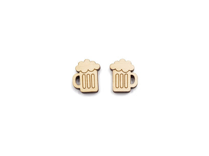 a pair of wooden cabochon stud earring blanks cut and engraved to look like mugs of beer